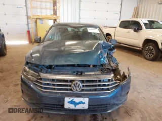 2019 Volkswagen Jetta S z VIN 3VWCB7BU9KM194136, wystawiony jako IAAI lot #41463927 z przebiegiem 103 847 mil mil oraz . Historia ofert i sprzedaży dostępna na DreamBid. Obrazek 12.