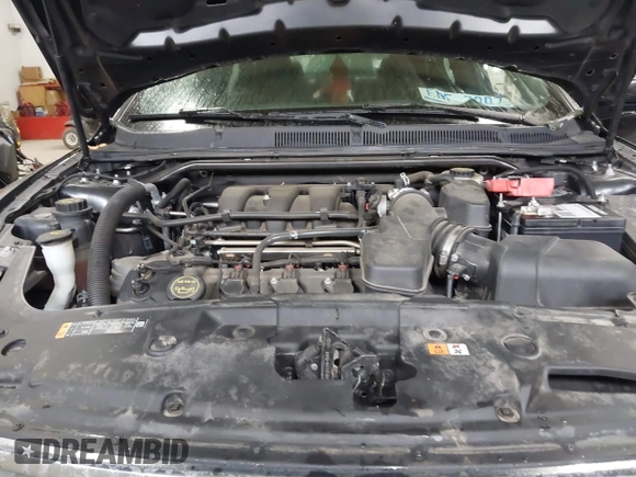 2015 Ford Taurus SEL with VIN 1FAHP2E87FG207029, listed as a IAAI auction lot 41752890 with 119,858 mi miles and . Bid and sale history available at carsss.com. Image 10.
