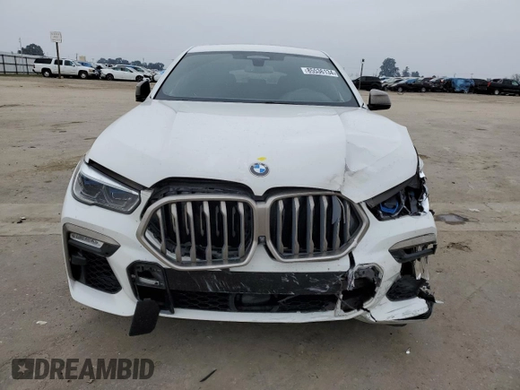 2021 BMW X6 M50i with VIN 5UXCY8C04M9D98395, listed as a Copart auction lot 85536134 with 57,891 mi miles and Salvage Title. Bid and sale history available at carsss.com. Image 5.