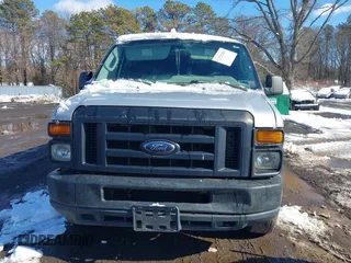 2009 Ford Econoline Cargo Commercial with VIN 1FTNE14W79DA55983, listed as a IAAI auction lot 41525683 with 374,949 mi miles and . Bid and sale history available at DreamBid. Image 12.