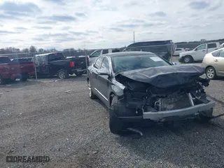 2018 Chevrolet Impala Premier with VIN 1G1125S33JU144065, listed as a IAAI auction lot 41635549 with 103,607 mi miles. Bid and sale history available at carsss.com. Image 1.
