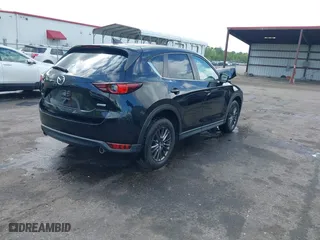 2019 Mazda CX-5 Touring with VIN JM3KFACM6K0672294, listed as a IAAI auction lot 42003210 with 50,127 mi miles. Bid and sale history available at carsss.com. Image 4.