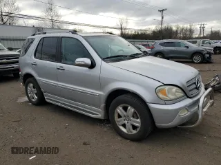 2005 Mercedes-Benz M 500 with VIN 4JGAB75E65A532359, listed as a Copart auction lot 41510825 with 139,916 mi miles and Salvage title. Bid and sale history available at DreamBid. Image 4.