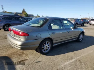 1998 Ford Contour LX с VIN 1FAFP66L5WK236964, выставлен на аукционе Copart как лот 46866675 с пробегом 91 107 миль миль и Чистый • Clean title. История ставок и продаж доступна на DreamBid. Изображение 3.