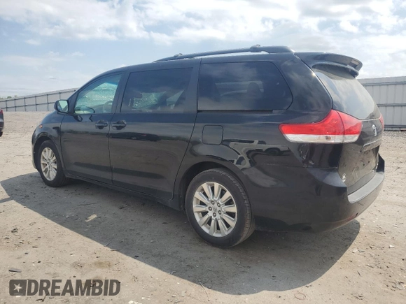 2014 Toyota Sienna Limited z VIN 5TDDK3DC2ES075367, wystawiony jako Copart lot #54010085 z przebiegiem 148 312 mil mil oraz Szkoda całkowita • Salvage title. Historia ofert i sprzedaży dostępna na DreamBid. Obrazek 2.