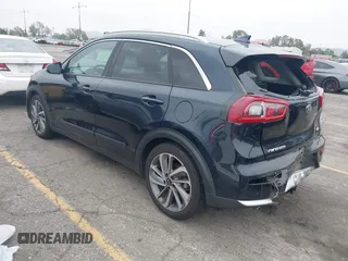 2017 Kia Niro Touring with VIN KNDCE3LC6H5048381, listed as a IAAI auction lot 42035129 with 133,559 mi miles. Bid and sale history available at carsss.com. Image 3.