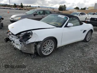 1999 Porsche Boxster z VIN WP0CA2986XU624032, wystawiony jako Copart lot #44574045 z przebiegiem 40 118 mil mil oraz Szkoda całkowita • Salvage title. Historia ofert i sprzedaży dostępna na DreamBid. Obrazek 1.