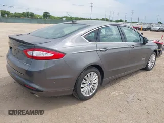 2014 Ford Fusion Titanium with VIN 3FA6P0SU0ER269411, listed as a IAAI auction lot 42163704 with 169,355 mi miles and . Bid and sale history available at DreamBid. Image 4.