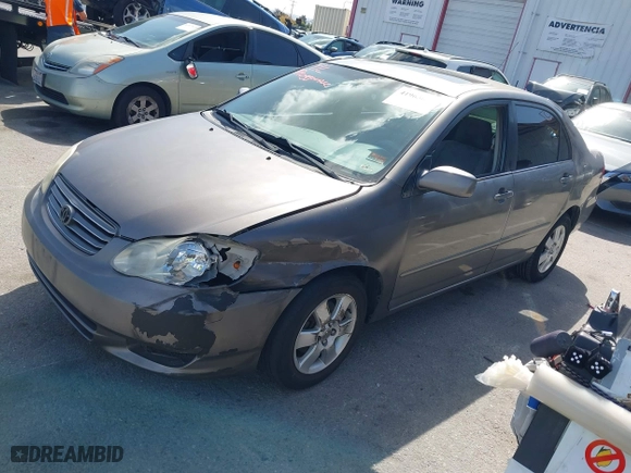 2004 Toyota Corolla CE with VIN 1NXBR38E84Z331547, listed as a IAAI auction lot 41963632 with 202,984 mi miles. Bid and sale history available at carsss.com. Image 17.