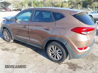 2017 Hyundai Tucson SE with VIN KM8J23A40HU525982, listed as a IAAI auction lot 41790898 with 107,715 mi miles. Bid and sale history available at carsss.com. Image 3.