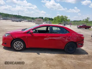 2018 Toyota Corolla L with VIN 2T1BURHE7JC105479, listed as a IAAI auction lot 42540566 with 67,487 mi miles and . Bid and sale history available at DreamBid. Image 14.
