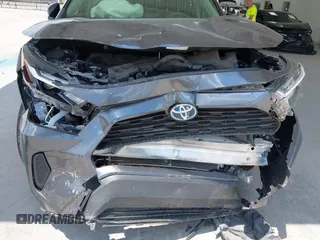 2023 Toyota RAV4 Hybrid LE with VIN JTMLWRFV6PD203044, listed as a IAAI auction lot 42320080 with 95,747 mi miles and . Bid and sale history available at DreamBid. Image 6.