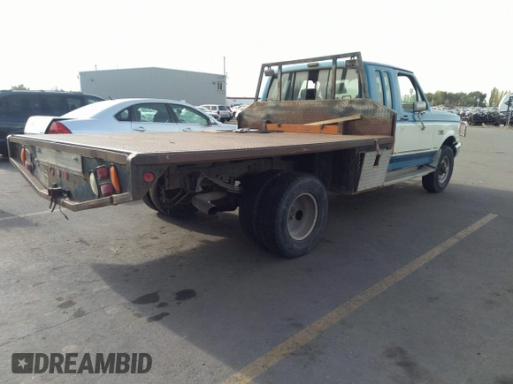 1990 Ford F-250 with VIN 1FTHX26G2LKA30043, listed as a IAAI auction lot 34569128 with 31,439 mi miles and . Bid and sale history available at DreamBid. Image 4.