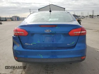 2018 Ford Focus SE z VIN 1FADP3F27JL260280, wystawiony jako Copart lot #54690975 z przebiegiem 73 322 mil mil oraz Szkoda całkowita • Salvage title. Historia ofert i sprzedaży dostępna na DreamBid. Obrazek 6.