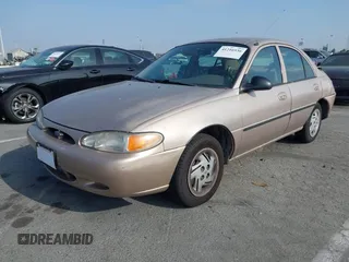 1999 Ford Escort LX with VIN 1FAFP10P3XW138847, listed as a IAAI auction lot 41216936 with 62,672 mi miles. Bid and sale history available at carsss.com. Image 2.