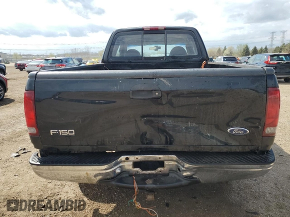 1999 Ford F-150 with VIN 1FTRX18W1XKC00918, listed as a Copart auction lot 53830305 with 205,205 mi miles and Salvage title. Bid and sale history available at DreamBid. Image 6.