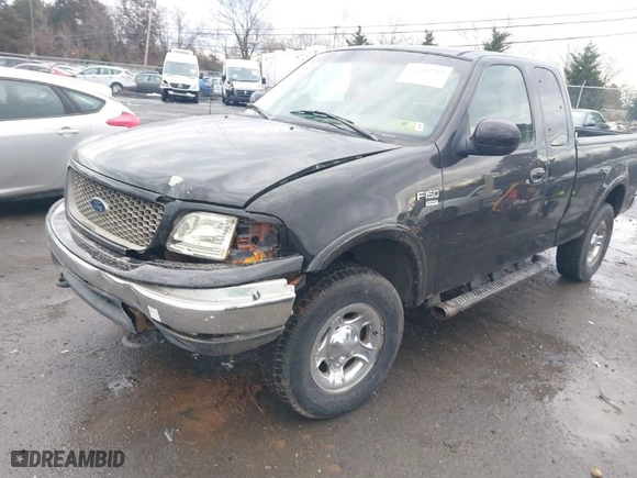 2000 Ford F-150 XL with VIN 1FTRX18W9YNA63551, listed as a IAAI auction lot 41446703 with 1 mi miles. Bid and sale history available at carsss.com. Image 2.