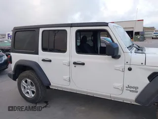 2019 Jeep Wrangler Unlimited Sport S with VIN 1C4HJXDG2KW500662, listed as a IAAI auction lot 42571152 with 45,067 mi miles and . Bid and sale history available at DreamBid. Image 13.