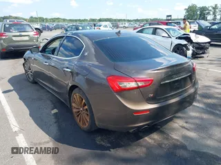 2015 Maserati Ghibli S Q4 with VIN ZAM57RTA7F1154097, listed as a IAAI auction lot 42568564 with 113,436 mi miles and . Bid and sale history available at DreamBid. Image 3.