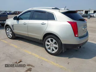 2015 Cadillac SRX Premium Collection with VIN 3GYFNDE38FS561936, listed as a IAAI auction lot 42266801 with 64,820 mi miles and . Bid and sale history available at DreamBid. Image 3.