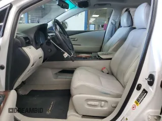 2010 Lexus RX 350 with VIN 2T2BK1BA3AC002553, listed as a Copart auction lot 56052635 with 219,138 mi miles and Salvage Title. Bid and sale history available at DreamBid. Image 7.