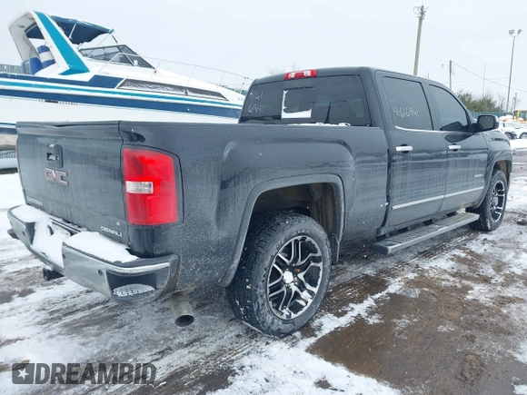 2014 GMC Sierra 1500 Denali z VIN 3GTU2WEC9EG310426, wystawiony jako IAAI lot #41616941 z przebiegiem 115 808 mil mil oraz . Historia ofert i sprzedaży dostępna na DreamBid. Obrazek 4.