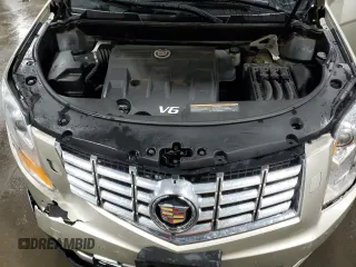 2014 Cadillac SRX Premium Collection с VIN 3GYFNDE3XES611363, выставлен на аукционе Copart как лот 50643475 с пробегом 57 749 миль миль и Списание • Salvage title. История ставок и продаж доступна на DreamBid. Изображение 13.