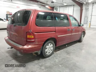1998 Ford Windstar LX with VIN 2FMZA5142WBC83393, listed as a IAAI auction lot 41246821 with 203,338 mi miles and . Bid and sale history available at carsss.com. Image 4.