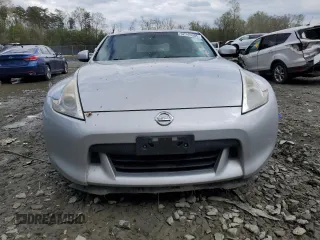 2010 Nissan 370Z with VIN JN1AZ4EH6AM505621, listed as a Copart auction lot 52745505 with 107,660 mi miles and Salvage Title. Bid and sale history available at carsss.com. Image 5.