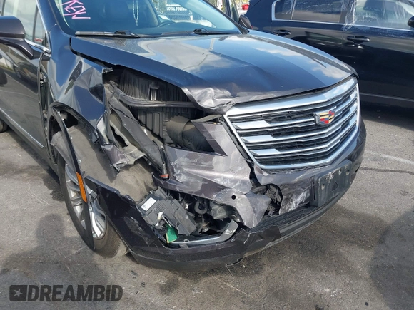 2018 Cadillac XT5 Luxury FWD with VIN 1GYKNCRS4JZ133643, listed as a IAAI auction lot 41916134 with 68,005 mi miles and . Bid and sale history available at carsss.com. Image 6.