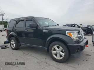 2007 Dodge Nitro SXT z VIN 1D8GU28K47W731172, wystawiony jako Copart lot #59954825 z przebiegiem 121 455 mil mil oraz Szkoda całkowita • Salvage title. Historia ofert i sprzedaży dostępna na DreamBid. Obrazek 4.