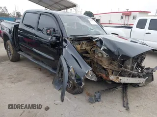2020 Toyota Tacoma SR5 z VIN 5TFCZ5AN7LX222850, wystawiony jako IAAI lot #42164970 z przebiegiem 50 035 mil mil oraz . Historia ofert i sprzedaży dostępna na DreamBid. Obrazek 1.