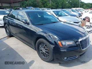 2014 Chrysler 300 S with VIN 2C3CCABG6EH143188, listed as a IAAI auction lot 42325817 with 157,117 mi miles and . Bid and sale history available at DreamBid. Image 1.