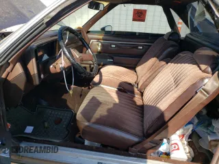 1983 Chevrolet El Camino z VIN 1GCCW80H5DR255003, wystawiony jako Copart lot #63256084 z przebiegiem 23 199 mil mil oraz Szkoda całkowita • Salvage title. Historia ofert i sprzedaży dostępna na DreamBid. Obrazek 7.