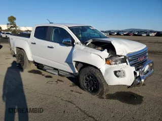 2018 GMC Canyon 4WD SLT z VIN 1GTG6DEN3J1143092, wystawiony jako Copart lot #46322305 z przebiegiem 64 599 mil mil oraz Szkoda całkowita • Salvage title. Historia ofert i sprzedaży dostępna na DreamBid. Obrazek 4.