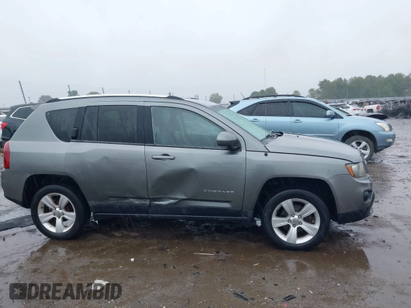 2014 Jeep Compass Latitude with VIN 1C4NJCEB2ED522109, listed as a IAAI auction lot 40282558 with 168,954 mi miles and . Bid and sale history available at carsss.com. Image 13.
