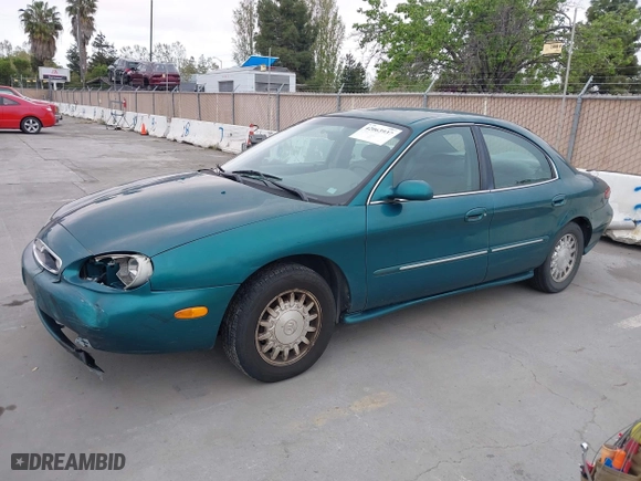 1996 Mercury Sable LS with VIN 1MELM53S0TG600877, listed as a IAAI auction lot 42063937 with 200,405 mi miles. Bid and sale history available at carsss.com. Image 2.