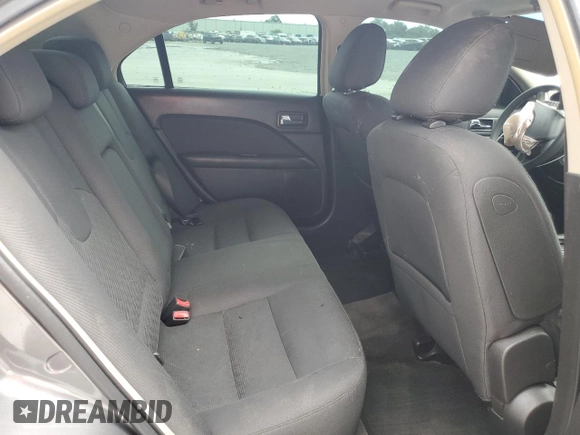 2010 Ford Fusion SE z VIN 3FAHP0HA3AR387128, wystawiony jako Copart lot #59149735 z przebiegiem Nie podano mil oraz Nie do naprawy • Non repairable. Historia ofert i sprzedaży dostępna na DreamBid. Obrazek 10.