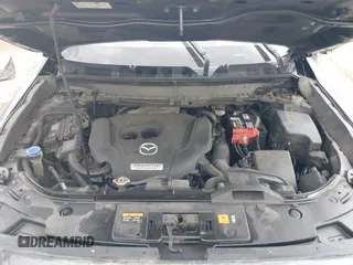 2016 Mazda CX-9 Grand Touring with VIN JM3TCBDY3G0117802, listed as a IAAI auction lot 42150821 with 157,760 mi miles and . Bid and sale history available at DreamBid. Image 10.