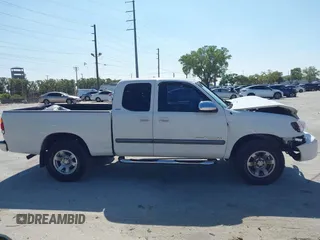 2003 Toyota Tundra SR5 with VIN 5TBRT34113S413221, listed as a IAAI auction lot 41797319 with 162,603 mi miles and . Bid and sale history available at DreamBid. Image 13.