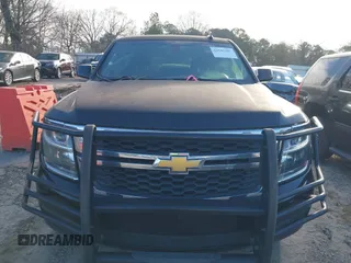 2015 Chevrolet Tahoe Commercial z VIN 1GNLC2EC4FR535329, wystawiony jako IAAI lot #41643486 z przebiegiem 185 326 mil mil oraz . Historia ofert i sprzedaży dostępna na DreamBid. Obrazek 12.