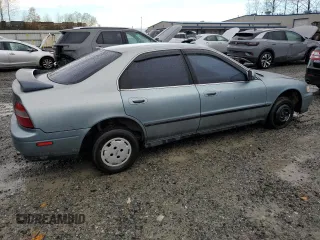 1995 Honda Accord LX with VIN JHMCD5632SC061723, listed as a Copart auction lot 79943104 with 251,242 mi miles and Salvage Title. Bid and sale history available at carsss.com. Image 3.