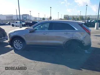 2023 Cadillac XT4 FWD Luxury z VIN 1GYAZAR40PF135132, wystawiony jako IAAI lot #41684609 z przebiegiem 12 164 mil mil oraz . Historia ofert i sprzedaży dostępna na DreamBid. Obrazek 15.