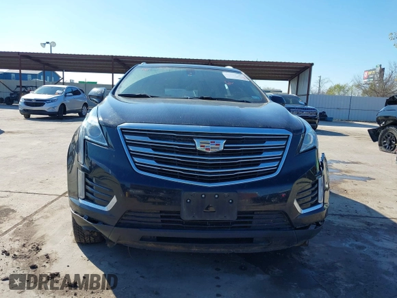 2019 Cadillac XT5 FWD with VIN 1GYKNARS7KZ117913, listed as a IAAI auction lot 41228767 with 105,335 mi miles and . Bid and sale history available at carsss.com. Image 12.