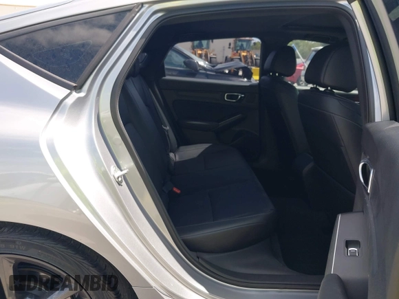 2023 Acura Integra w/A-Spec Package with VIN 19UDE4H39PA009519, listed as a IAAI auction lot 42168571 with 14,661 mi miles and . Bid and sale history available at DreamBid. Image 8.