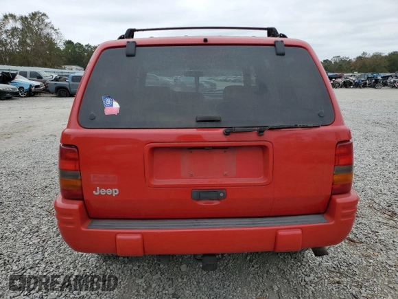 1998 Jeep Grand Cherokee Limited z VIN 1J4GZ78S0WC276411, wystawiony jako Copart lot #78200114 z przebiegiem 220 856 mil mil oraz Szkoda całkowita • Salvage title. Historia ofert i sprzedaży dostępna na DreamBid. Obrazek 6.