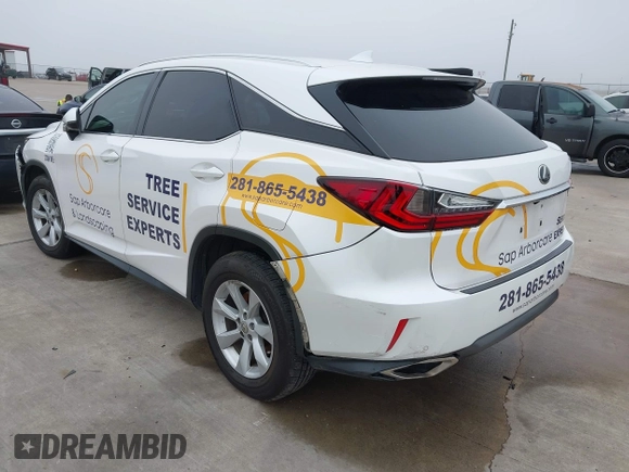 2016 Lexus RX 350 with VIN 2T2BZMCA5GC032156, listed as a IAAI auction lot 41623595 with 133,103 mi miles and . Bid and sale history available at DreamBid. Image 3.