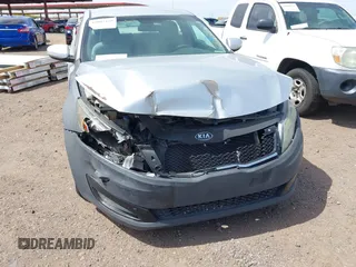 2012 Kia Optima LX with VIN 5XXGM4A7XCG063387, listed as a IAAI auction lot 42087129 with 180,585 mi miles and . Bid and sale history available at carsss.com. Image 6.