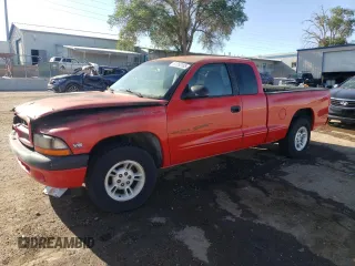 1998 Dodge Dakota SLT with VIN 1B7GL22X4WS693521, listed as a Copart auction lot 61250105 with 97,534 mi miles and Salvage title. Bid and sale history available at DreamBid. Image 1.
