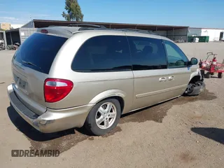 2005 Dodge Caravan SXT with VIN 2D8GP44L05R459369, listed as a IAAI auction lot 42638057 with 76,777 mi miles and . Bid and sale history available at DreamBid. Image 4.